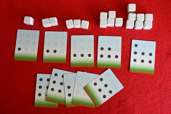 Usk 'Frame Cards' have been placed such that dots and nube of cubes match